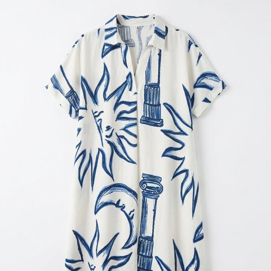 Vestido oversize estampado abstracto azul con cuello camisero y escote en V, manga corta amplia y bolsillos laterales, diseño fluido y elegante con tejido ligero y transpirable ideal para verano, look moderno y versátil perfecto para día a día