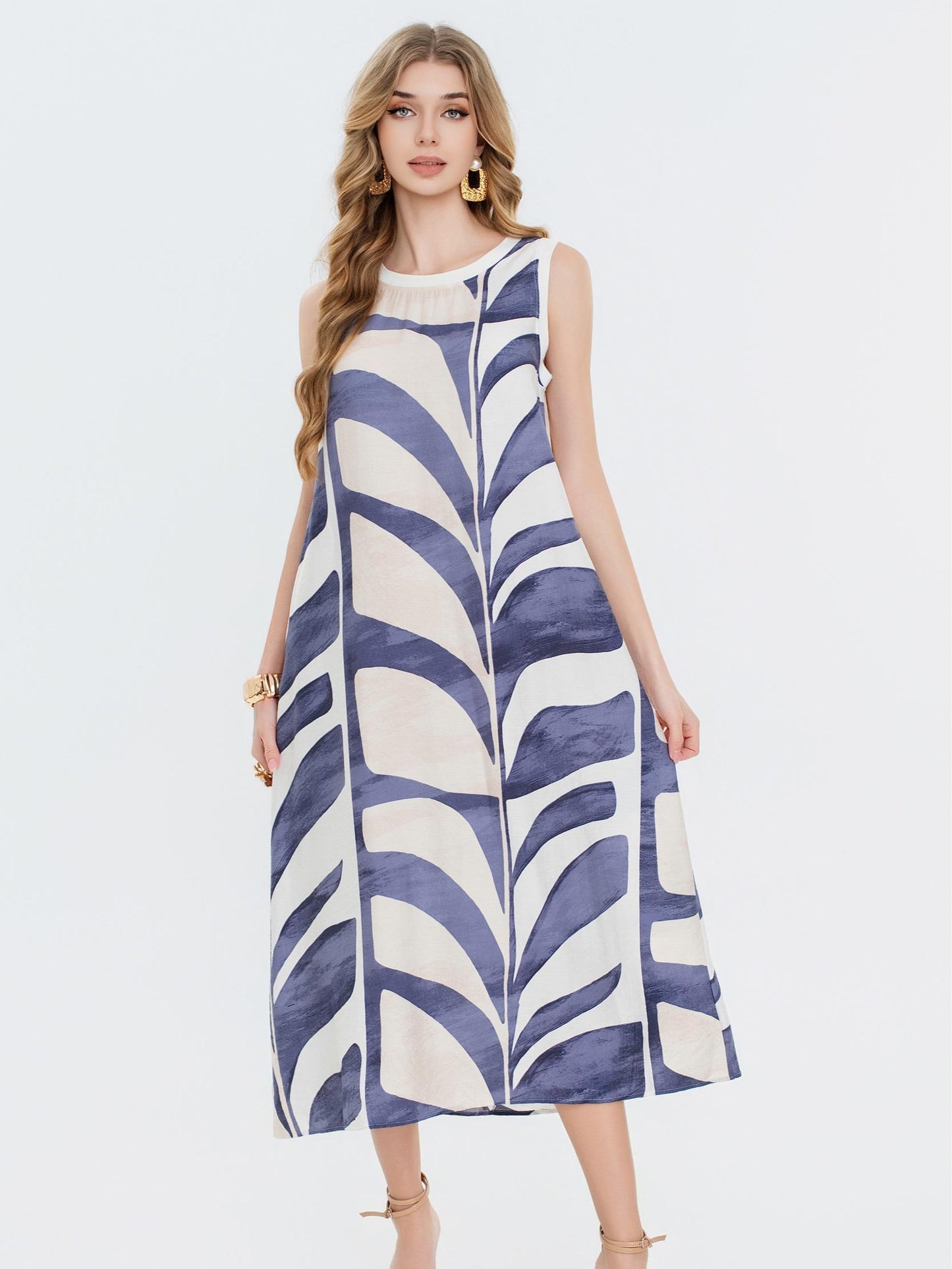 Vestido estampado  con cuello redondo sin mangas, corte amplio fluido estilo elegante casual y tejido ligero ideal para verano