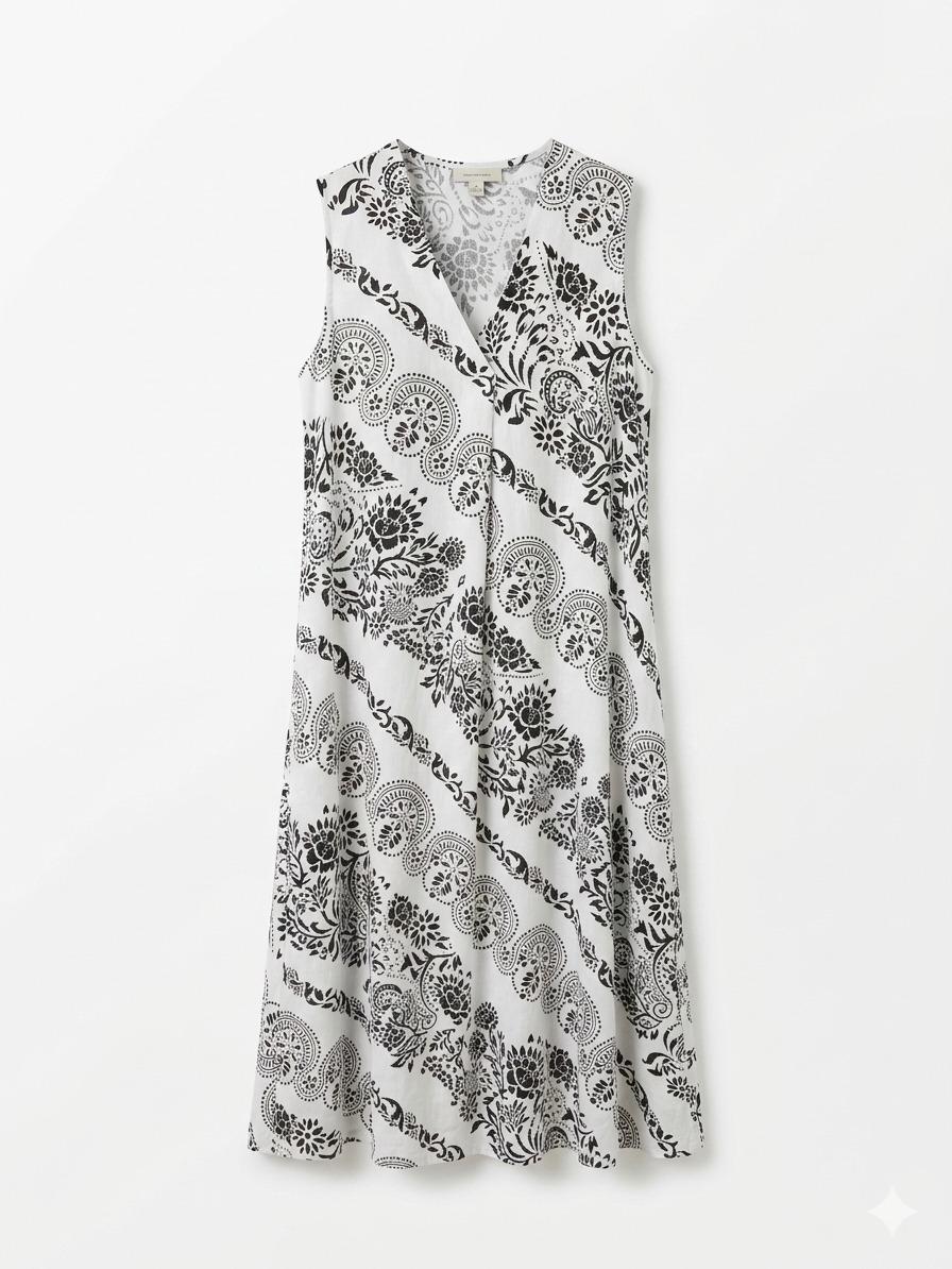 Vestido  estampado  estilo boho con escote en V, corte fluido y tejido ligero ideal para verano, diseño cómodo y elegante perfecto para looks casuales o vacaciones