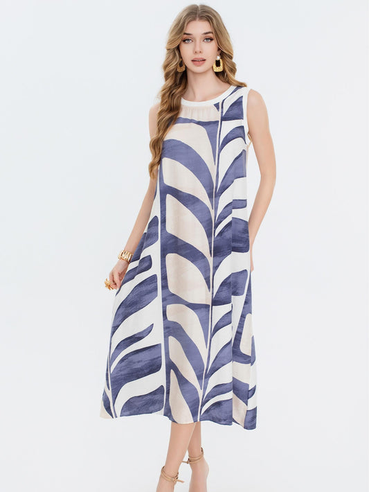 Vestido estampado  con cuello redondo sin mangas, corte amplio fluido estilo elegante casual y tejido ligero ideal para verano
