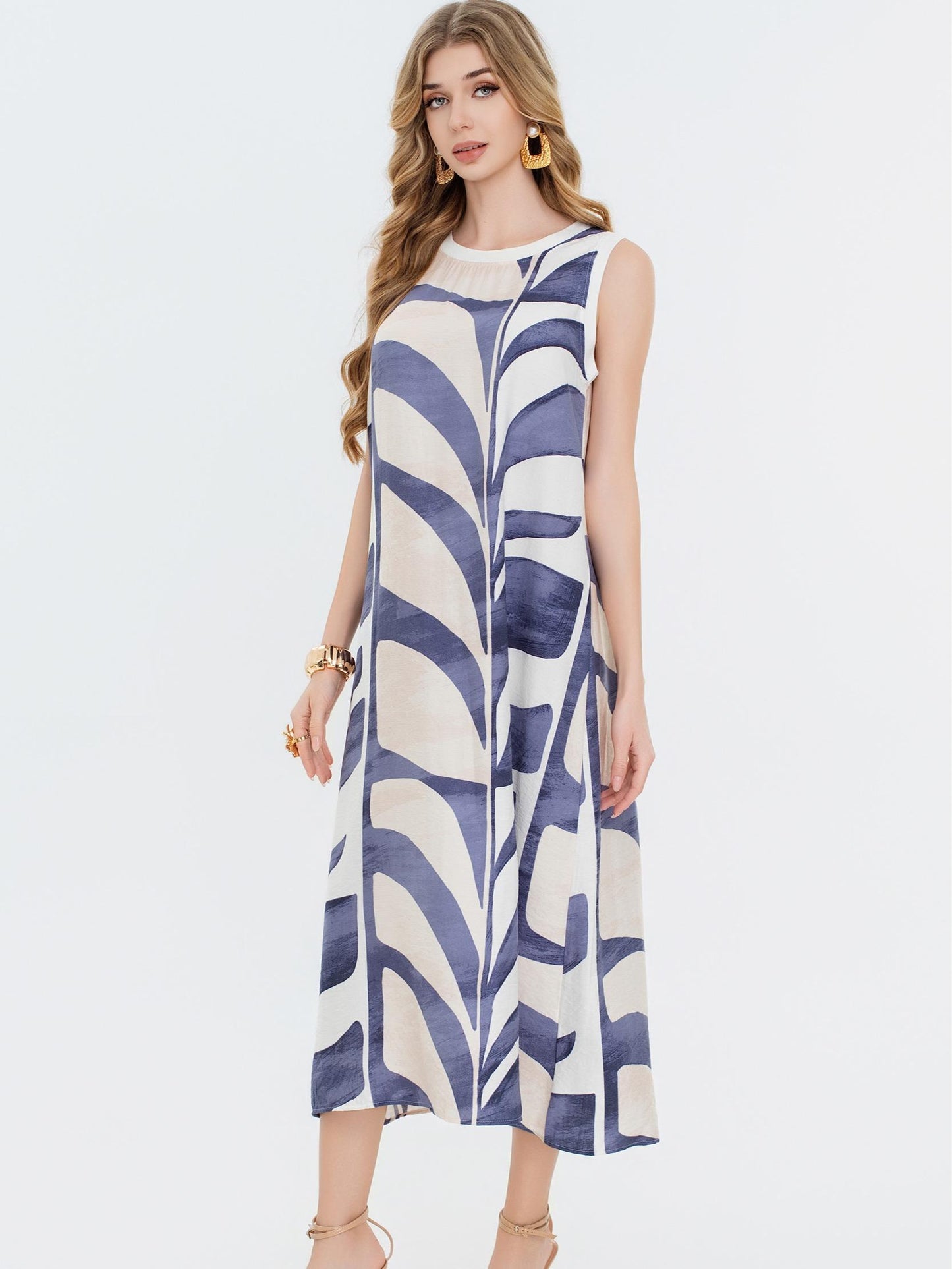 Vestido estampado  con cuello redondo sin mangas, corte amplio fluido estilo elegante casual y tejido ligero ideal para verano