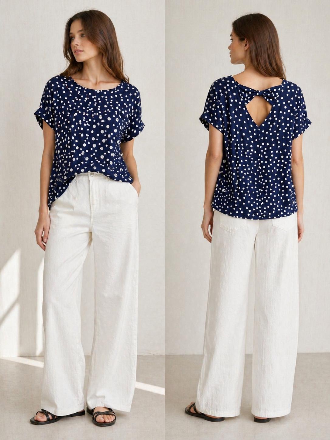 YULVET Blusa fluida de lunares con caída ligera y escote redondo, diseño oversize con manga corta y detalle trasero abierto con lazada elegante