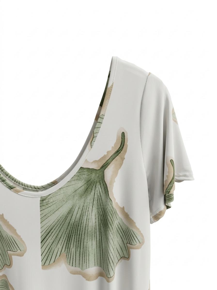 Mono largo fluido estampado con manga corta, escote redondo y pernera amplia estilo elegante con bolsillos laterales