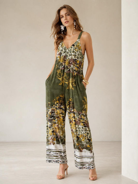 Mono largo fluido estampado estilo artístico con tirantes anchos, escote en pico y pernera amplia con bolsillos laterales