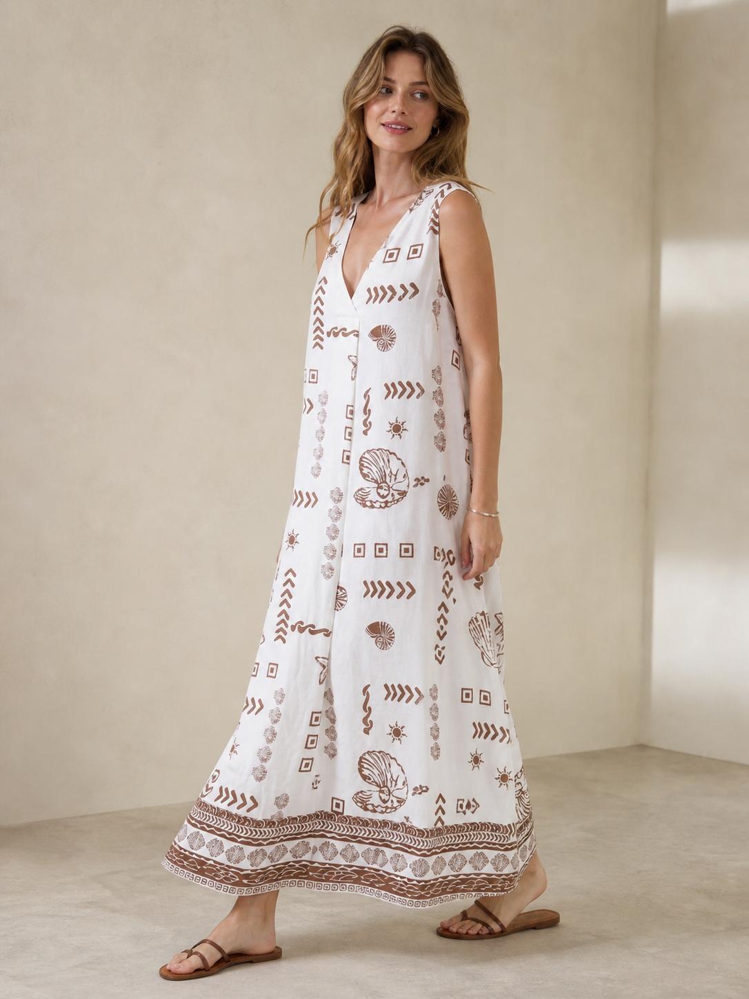 Vestido estampado estilo boho con escote en V, corte fluido y tejido ligero ideal para verano, diseño cómodo y elegante perfecto para looks casuales o vacaciones